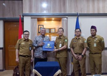 Bupati Muaro Jambi Dr. Bambang Bayu Suseno Melakukan Penandatanganan Nota Kesepakatan Kerjasama Dengan Direktur Politeknik Kesehatan Kemenkes Jambi